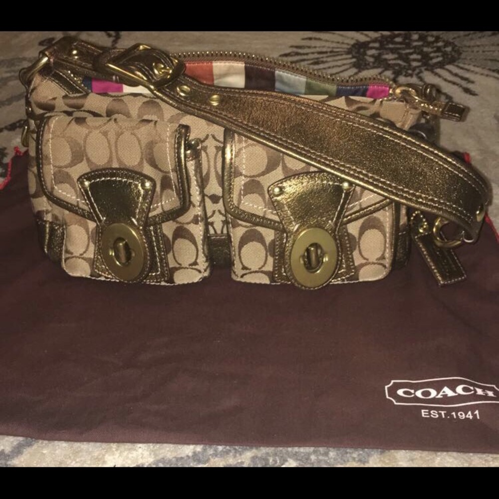 Coach gold monogram legacy bag